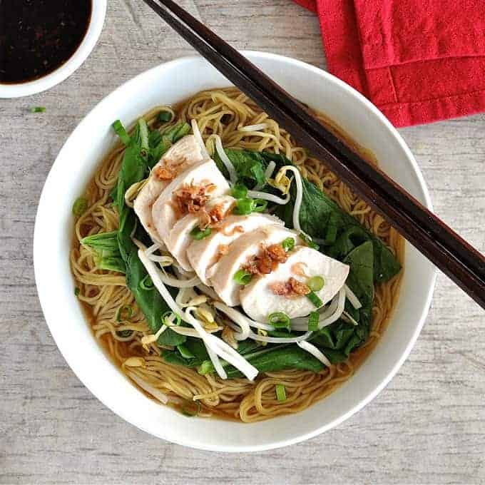{350 calories, super easy} Foolproof method to make perfect poached chicken for this delicious noodle soup!