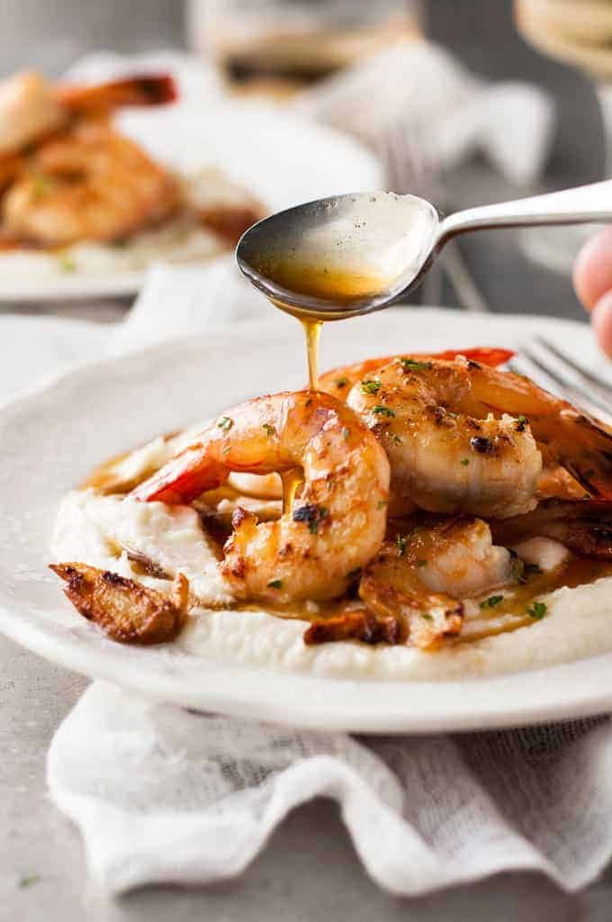 Pouring sauce over Garlic Brown Butter Shrimp (Prawns)