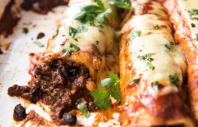 The BEST Beef Enchiladas, with an extra tasty, extra saucy filling and the most incredible homemade Enchilada Sauce! recipetineats.com