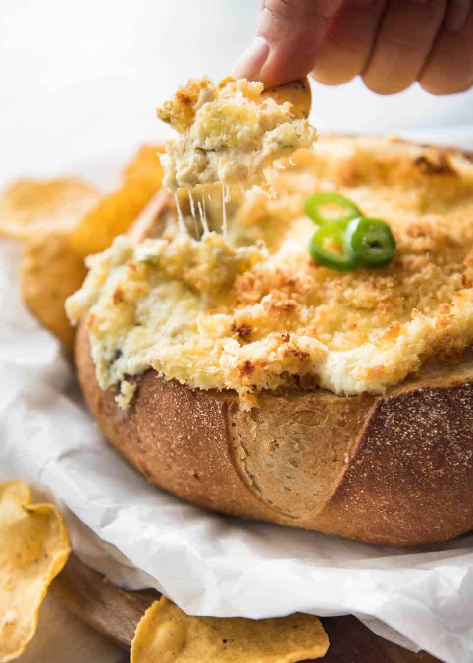 It's a Jalapeño Popper - in dip form! A warm creamy dip spiked with jalapeño, topped with a crunchy panko topping! www.recipetineats.com