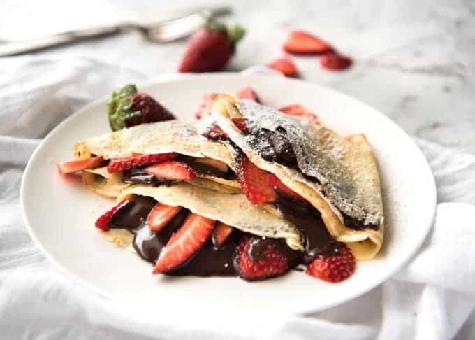 Homemade Nutella - Just hazelnuts, cocoa powder, confectionary / icing sugar, oil, vanilla and your blender is all you need to make an incredible blender at home! recipetineats.com