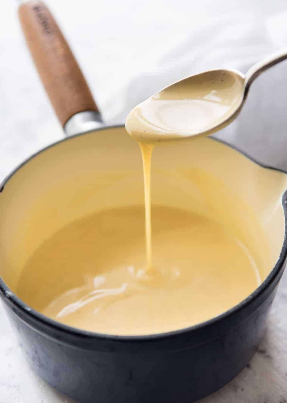 A classic, easy custard made using only egg as the thickener, no cornflour. Also known as Creme Anglaise, this is rich and stunning! www.recipetineats.com