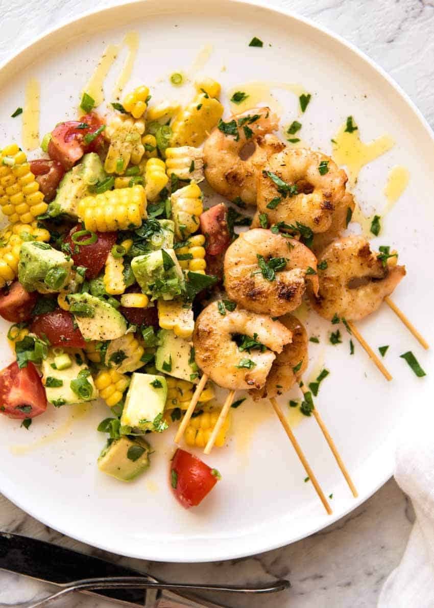 Corn Salad with Avocado on the side of Garlic Prawns