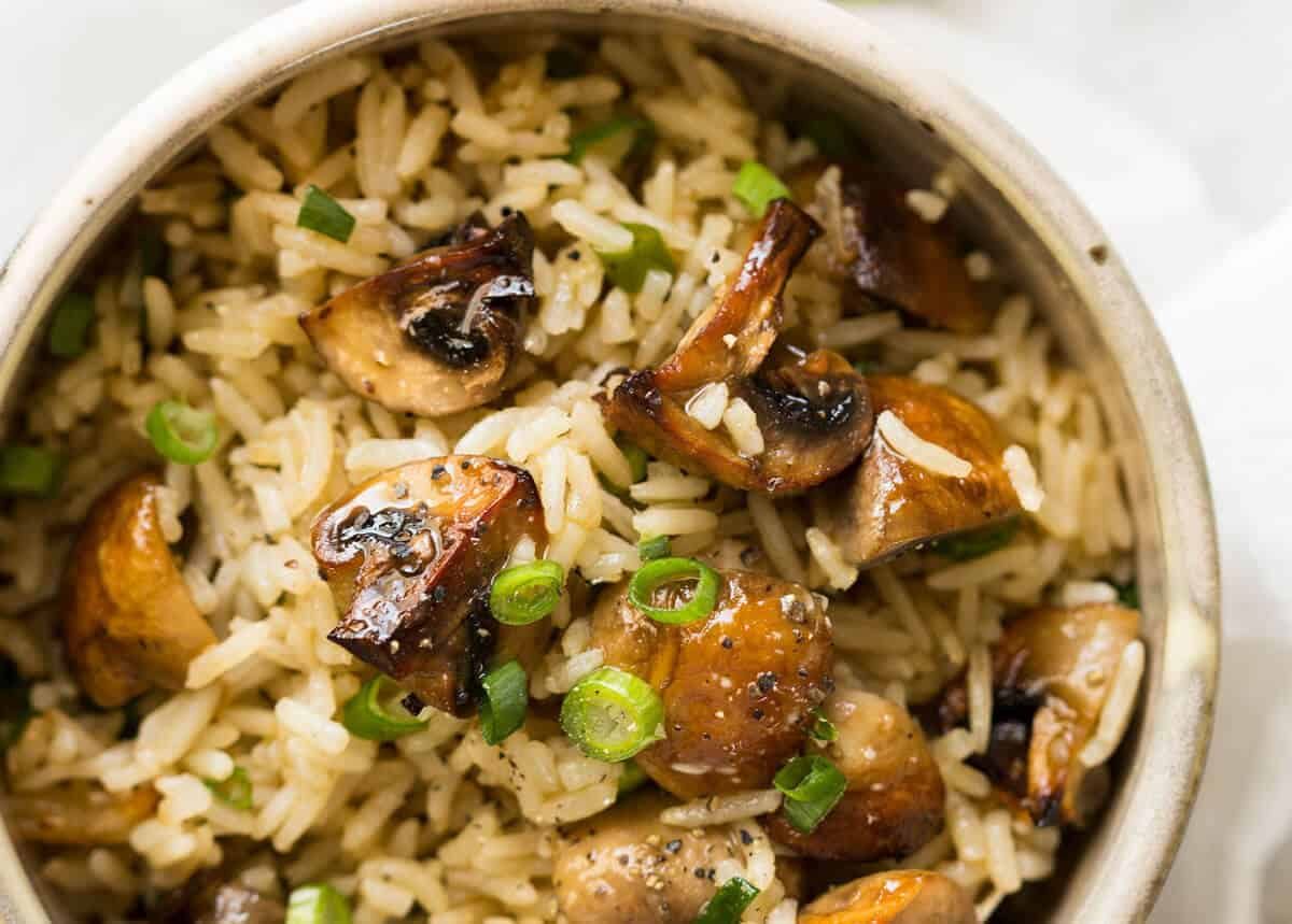 Baked Mushroom Rice - buttery, garlicky, golden brown juicy mushrooms and fluffy rice, all baked in one pan! recipetineats.com