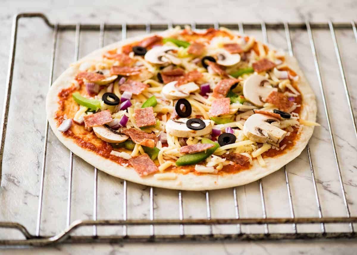 How to bake Crispy Base Pizza using Flatbread www.recipetineats.com