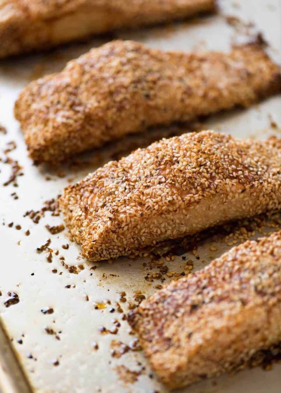 Just roll the salmon in sesame seeds, drizzle with oil and bake! You'll be amazed how well the sesame adheres to the salmon and love how crispy this Sesame Salmon comes out!