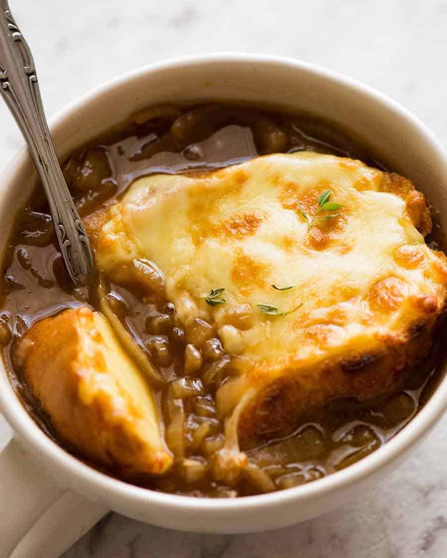Close up of French Onion Soup with cheese toast