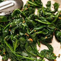 Garlic Sautéed Spinach in a skillet, ready to be served