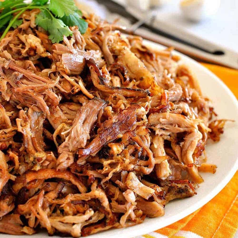 Pile of pork carnitas on a plate