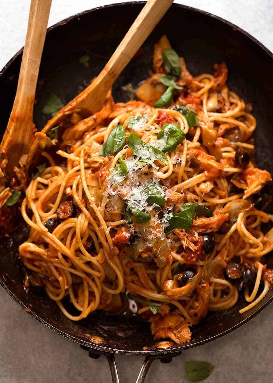 Sicilian Chicken Spaghetti in a black skillet, ready to be serced