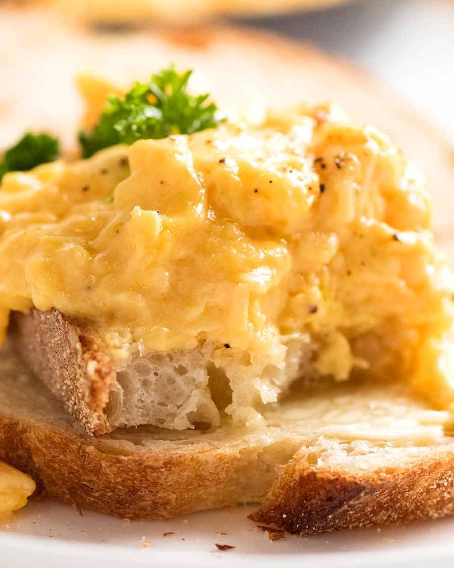 Showing inside of soft Scrambled Eggs on toast
