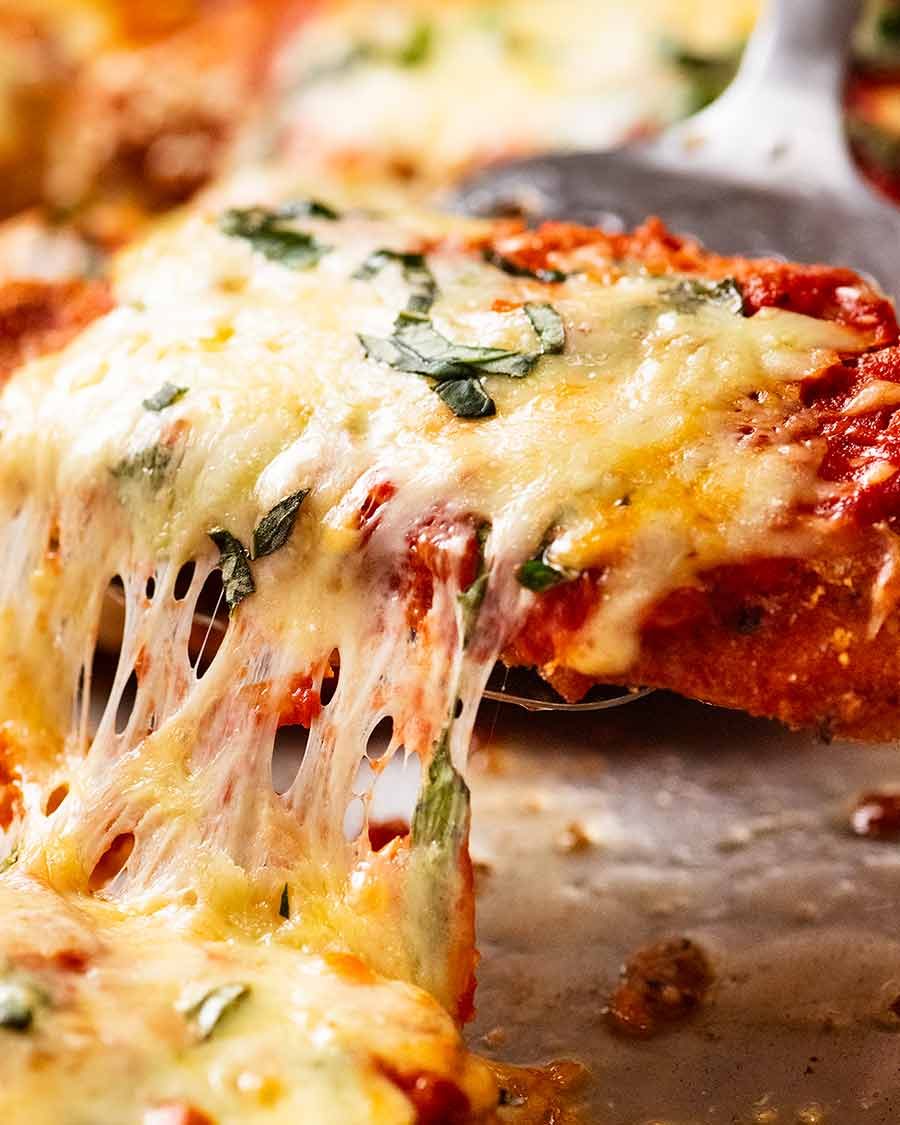 Cheese pull - picking up Chicken Parmigiana (Chicken Parmesan)