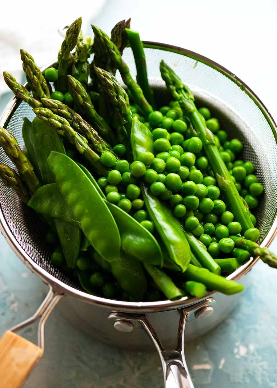 Blanched peas, asparagus and snow peas for Spring Salad