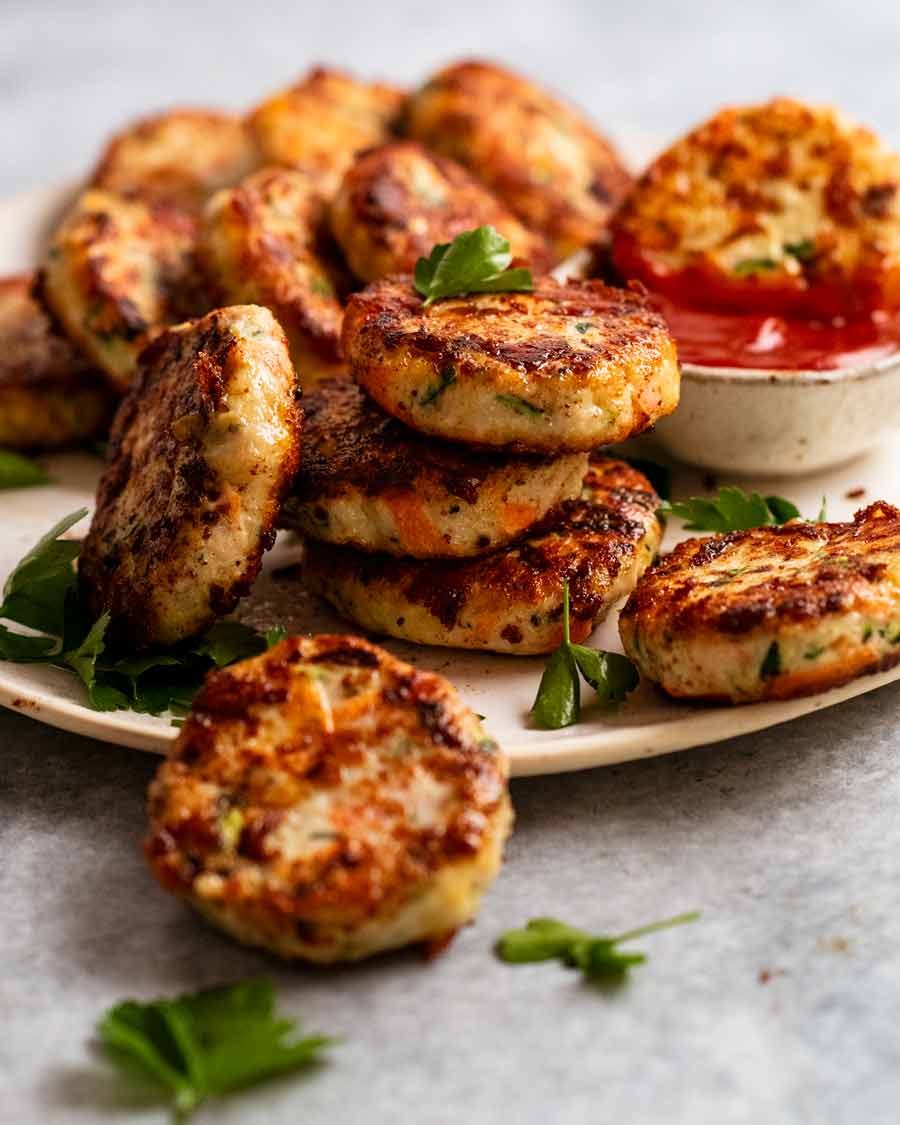 Pile of Chicken rissoles (chicken patties) on a plate, ready to be served